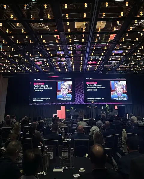 A Sydney ballroom with stage screens