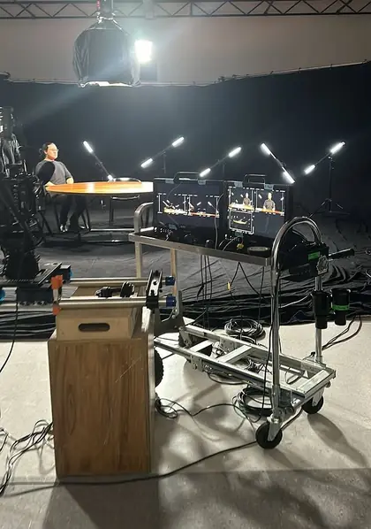 A stage and AV lighting rig being set up